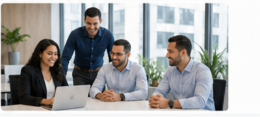 Technical team collaborating around a computer